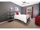 Bedroom with a neutral wall color, complemented by tasteful decor, creating a relaxing atmosphere at 1704 Hoofprint Court, Fruitland Park, FL 34731