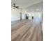 Open concept living room with modern hardwood floors and recessed lighting at 17459 Sw 17Th Cir, Ocala, FL 34473
