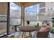 Relaxing screened patio with comfortable seating and pleasant view at 17519 Promenade Dr, Clermont, FL 34711