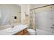 Bright bathroom with a shower and tub combo, and a functional single sink vanity at 1833 Endsley Ct, The Villages, FL 32162