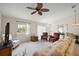 Bright and open living room featuring comfortable seating and large windows at 1833 Endsley Ct, The Villages, FL 32162