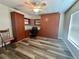 Spacious bedroom featuring built-in desk, shelving, and storage cabinets at 2071 Westchester Way, The Villages, FL 32162