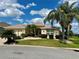 Charming home with a well-maintained lawn and landscaping at 2071 Westchester Way, The Villages, FL 32162