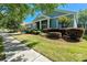 Charming single-story home with a well-manicured lawn and inviting curb appeal at 223 Crepe Myrtle Dr, Groveland, FL 34736