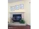 Elegant fireplace with decorative tile surround and ample natural light at 223 Lady Diana Dr, Davenport, FL 33837