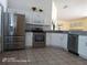 Well-appointed kitchen featuring stainless steel appliances and sleek granite countertops at 223 Lady Diana Dr, Davenport, FL 33837