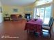 Spacious living room featuring wood floors, fireplace, and sliding glass doors at 223 Lady Diana Dr, Davenport, FL 33837