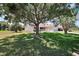 Charming home with well-manicured lawn and mature trees providing plenty of shade at 2290 Due West Dr, The Villages, FL 32162
