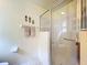Clean bathroom showcasing a glass-enclosed shower at 25044 Cranes Roost Cir, Leesburg, FL 34748