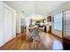 A bright dining room featuring hardwood floors and natural light at 25044 Cranes Roost Cir, Leesburg, FL 34748