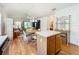 Open-concept living and dining area, perfect for entertaining and relaxing at 25044 Cranes Roost Cir, Leesburg, FL 34748