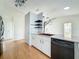 Well-lit kitchen featuring modern cabinetry, stainless steel appliances, and granite countertops at 25540 Belle Helene, Leesburg, FL 34748