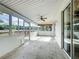 Inviting sunroom with abundant natural light and views of the surrounding landscape at 25540 Belle Helene, Leesburg, FL 34748