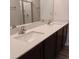Bathroom vanity features double sinks, quartz counters, and modern fixtures, plus shower at 27 Perch Dr, Kissimmee, FL 34759