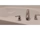 Close up of bathtub faucet hardware at 27 Perch Dr, Kissimmee, FL 34759