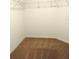 This closet space features neutral carpet and wire shelving at 27 Perch Dr, Kissimmee, FL 34759