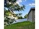 View of a grassy yard with a privacy fence, offering a secure and peaceful outdoor space at 27 Perch Dr, Kissimmee, FL 34759