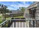 Scenic view from a balcony showcasing the lush greenery and charming architecture at 2934 Tangerine Ct, Leesburg, FL 34748