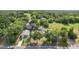 Aerial view showcasing the property and surrounding greenery at 30641 County Road 435, Sorrento, FL 32776