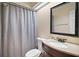 Bathroom featuring a shower, toilet, modern vanity, and a granite countertop at 30641 County Road 435, Sorrento, FL 32776