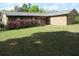 Charming one-story brick home with well-maintained lawn and mature landscaping at 30641 County Road 435, Sorrento, FL 32776