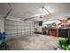 A spacious two car garage with tools and a side work bench at 30641 County Road 435, Sorrento, FL 32776
