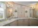 Bathroom featuring double sinks with plentiful counter space and cabinets at 3209 Manatee Rd, Tavares, FL 32778