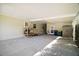 Spacious covered carport area with access to the home, providing ample parking and storage solutions at 3209 Manatee Rd, Tavares, FL 32778