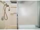 A standalone shower with glass doors and updated fixtures at 3209 Manatee Rd, Tavares, FL 32778
