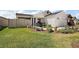 Home with a well-manicured front yard, attractive landscaping, and a two-car garage at 3222 Miller Stachler St, The Villages, FL 32163