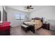 Inviting bedroom with a large window and serene views at 3256 Canna Lily Pl, Clermont, FL 34711