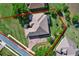 Aerial view of the house showing its landscaping and proximity to other homes and roads at 39705 Grove Hts, Lady Lake, FL 32159
