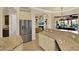 Kitchen showcases granite countertops, stainless steel appliances, and tile flooring at 39705 Grove Hts, Lady Lake, FL 32159
