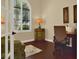 Bright office with French doors, hardwood floors, and a large arched window at 39705 Grove Hts, Lady Lake, FL 32159