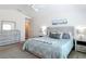 Comfortable bedroom showcasing neutral tones, stylish furniture, and a peaceful setting at 449 Gilson Loop, The Villages, FL 32163