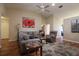 Comfortable living room with ceiling fan, neutral paint, and stylish furnishings at 5408 Queen Victoria Dr, Leesburg, FL 34748