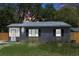 Charming single-story home featuring a new metal roof and freshly painted exterior at 602 Ross St, Leesburg, FL 34748