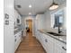 Well-equipped kitchen with granite countertops, stainless appliances and ample storage at 602 Ross St, Leesburg, FL 34748