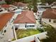 Aerial view of a home with a well-maintained backyard and patio area at 728 Ramirez Ave, The Villages, FL 32159