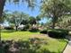 Beautifully landscaped community green space, offering a peaceful and inviting residential setting at 728 Ramirez Ave, The Villages, FL 32159