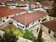 Birds-eye view of a home with a green lawn and patio in the backyard at 728 Ramirez Ave, The Villages, FL 32159