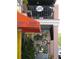 Downtown street view featuring quaint cafe with outdoor seating on balcony at 8043 Pine Hollow Dr, Mount Dora, FL 32757