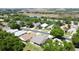 Residential neighborhood surrounded by lush trees with views of a tranquil lake at 860 Wolf Creek St, Clermont, FL 34711