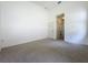 Spacious bedroom with carpet and ensuite bathroom at 860 Wolf Creek St, Clermont, FL 34711