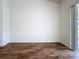 Bedroom with updated flooring and large windows at 860 Wolf Creek St, Clermont, FL 34711