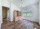Dining room with wood floors, chandelier lighting, and built-in cabinets at 860 Wolf Creek St, Clermont, FL 34711