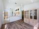 Open concept kitchen featuring white appliances and dining area at 860 Wolf Creek St, Clermont, FL 34711
