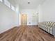 Spacious living room with new wood floors and bright natural light at 860 Wolf Creek St, Clermont, FL 34711