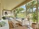 Cozy sunroom with sliding windows and abundant natural light at 860 Wolf Creek St, Clermont, FL 34711
