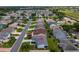 Aerial view of the homes in a quiet residential neighborhood at 870 Danforth Ct, The Villages, FL 32162
